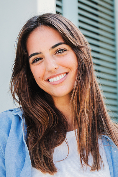 Blonde woman smiling with flawless teeth