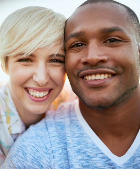 Selfie of man and woman smiling after aesthetic dentistry in San Jose