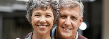 Senior man and woman smiling together