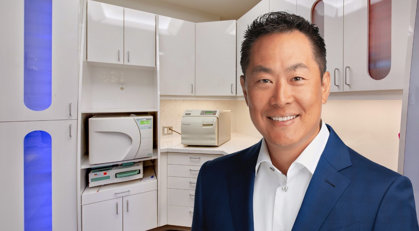 San Jose prosthodontist Doctor Steve Lim smiling in dental office